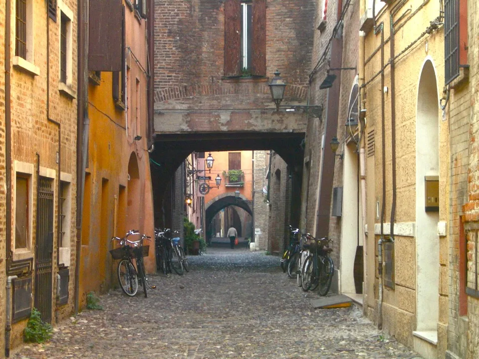 Medieval cobbled lane and bicycles in Ferrara