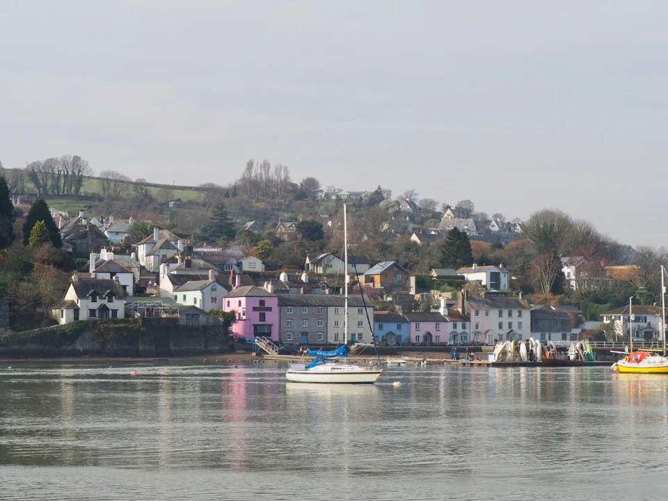 Colourful houses beside the River Dart in Devon