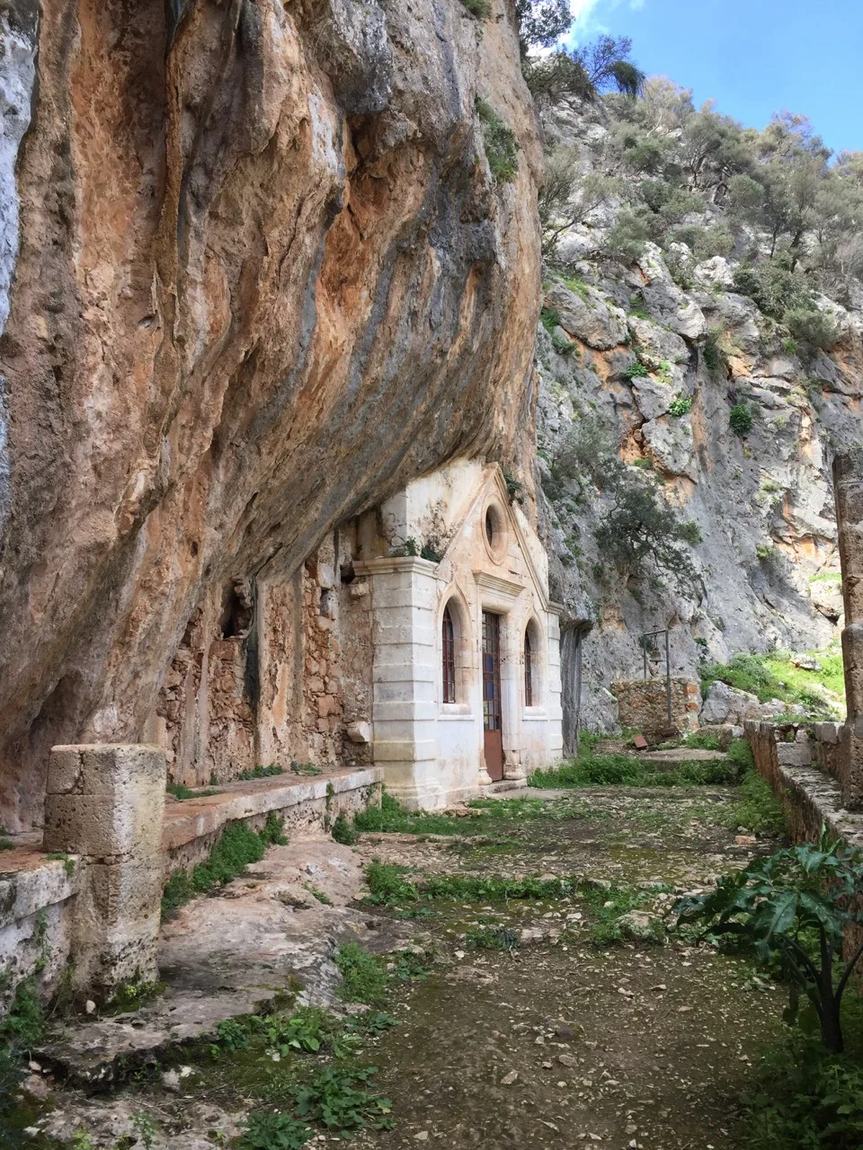 Cave chapel carved into a cliff in Crete