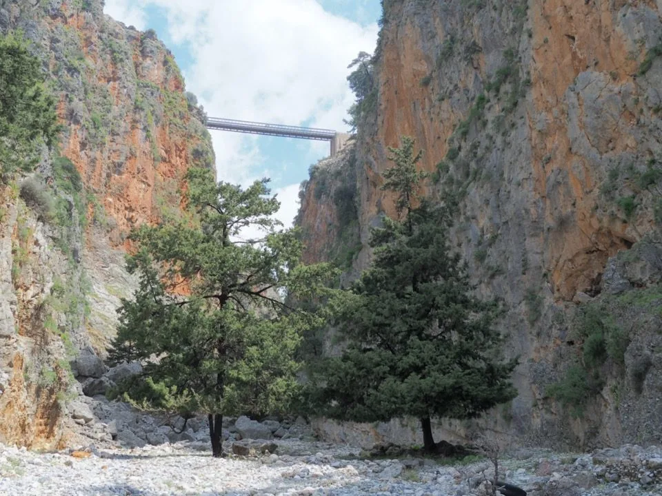 Suspension bridge between the cliffs of a Cretan gorge